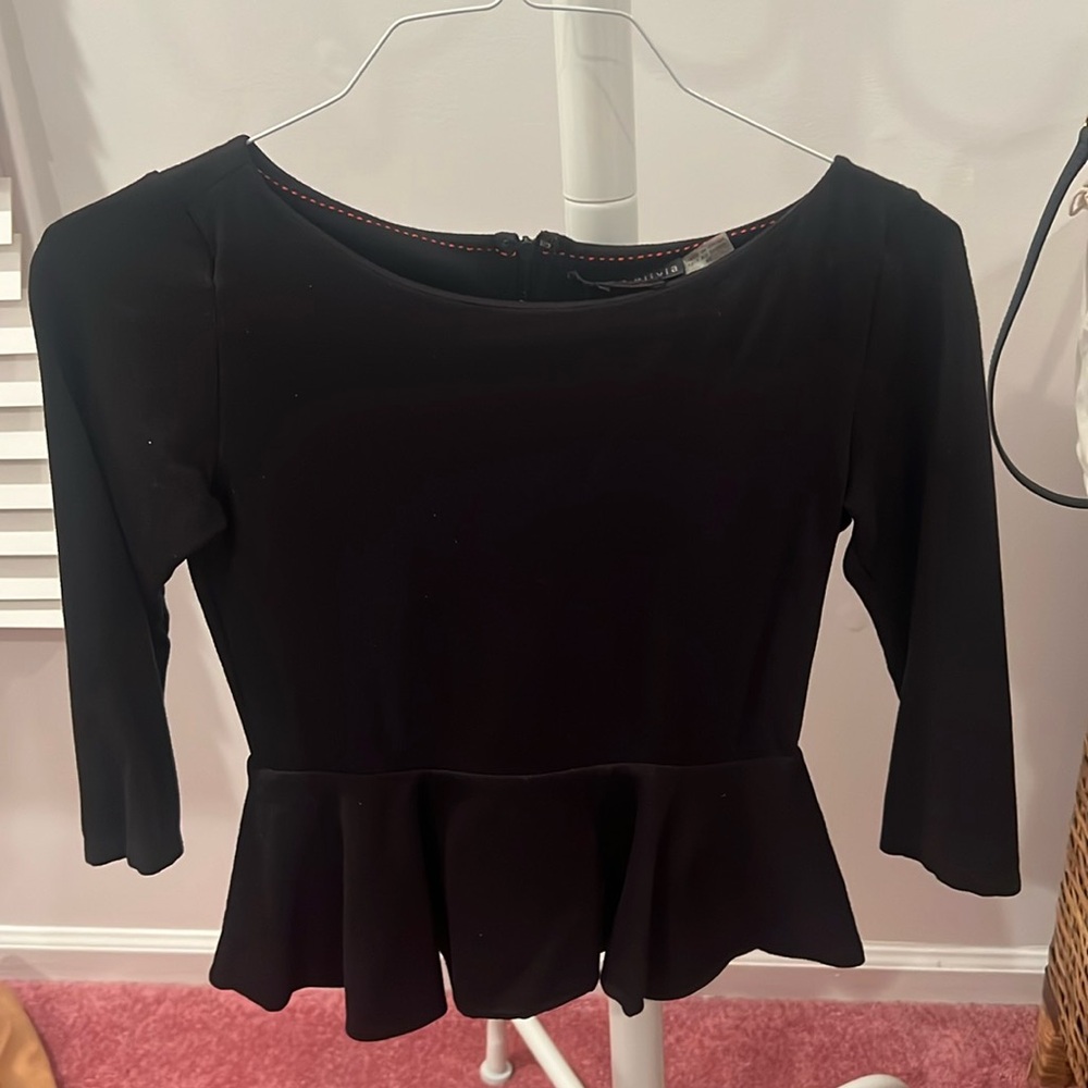 Black peplum quarter sleeve top